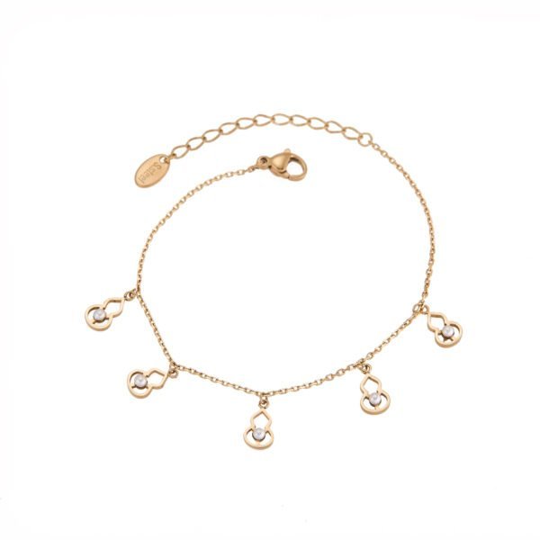 Collier doré avec perles blanches, style élégant et féminin, idéal pour accessoriser toutes vos tenues.