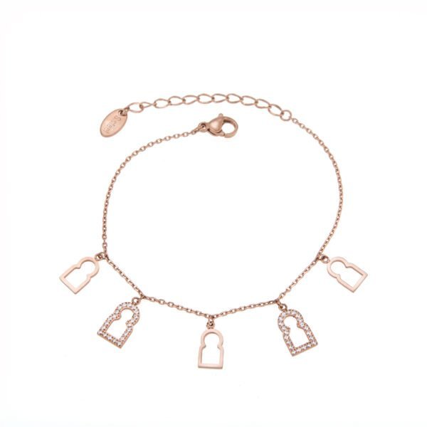 Bracelet chaîne dorée avec charms clips en forme de porte clous pavés de cristaux.