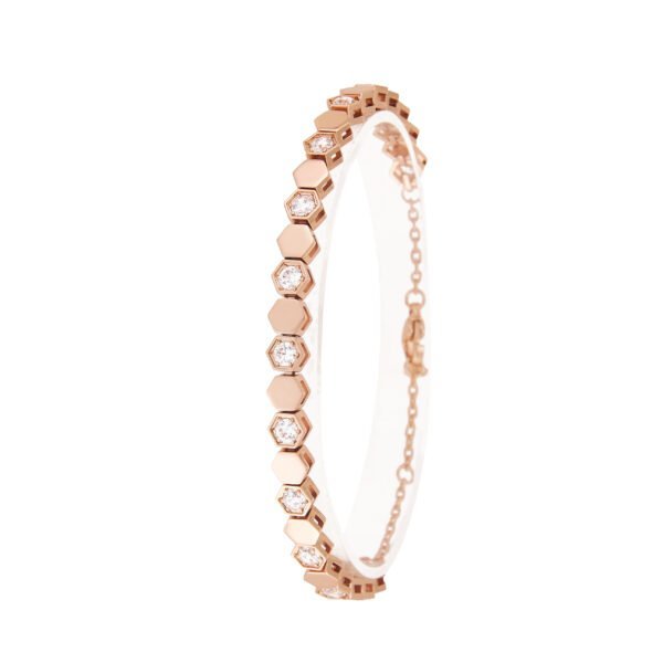 Bracelet en or rose avec diamants, bijouterie élégante et tendance, idée cadeau sophistiquée.
