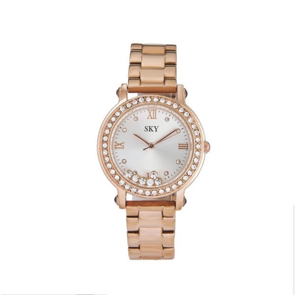 Montre femme en métal rose avec cristaux, design élégant et tendance par SKY BIJOUX.