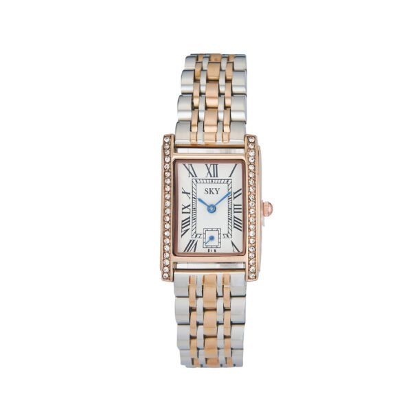 Montre femme Hermès avec bracelet en acier et or, cadran rectangulaire, détails brillants.