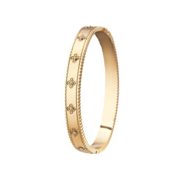 Bracelet en or avec motifs floraux pavés de diamants, design élégant et tendance chez SKY BIJOUX.