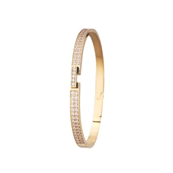 Bracelet doré pavé de cristaux Swarovski, élégant et tendance, bijou de luxe pour homme et femme.