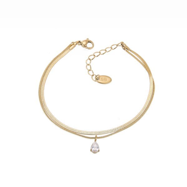 Collier chaîne or avec pendentif en pierre scintillante, élégance et raffinement.